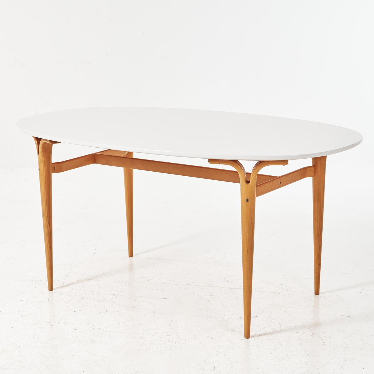 BRUNO MATHSSON. “Superellips”, table, Mathsson International, white lacquered table top, legs in oak.