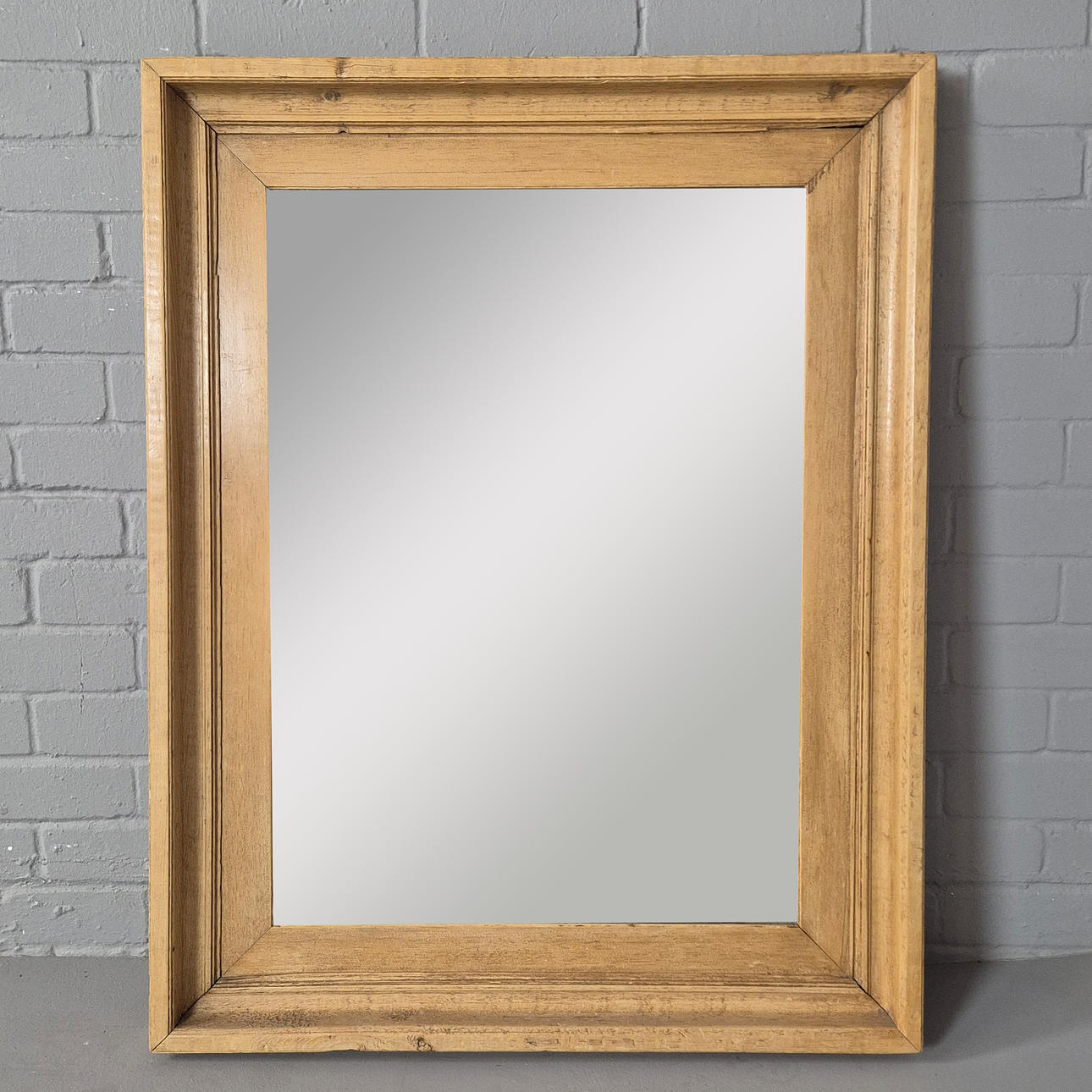 PINE FRAMED WALL MIRROR.