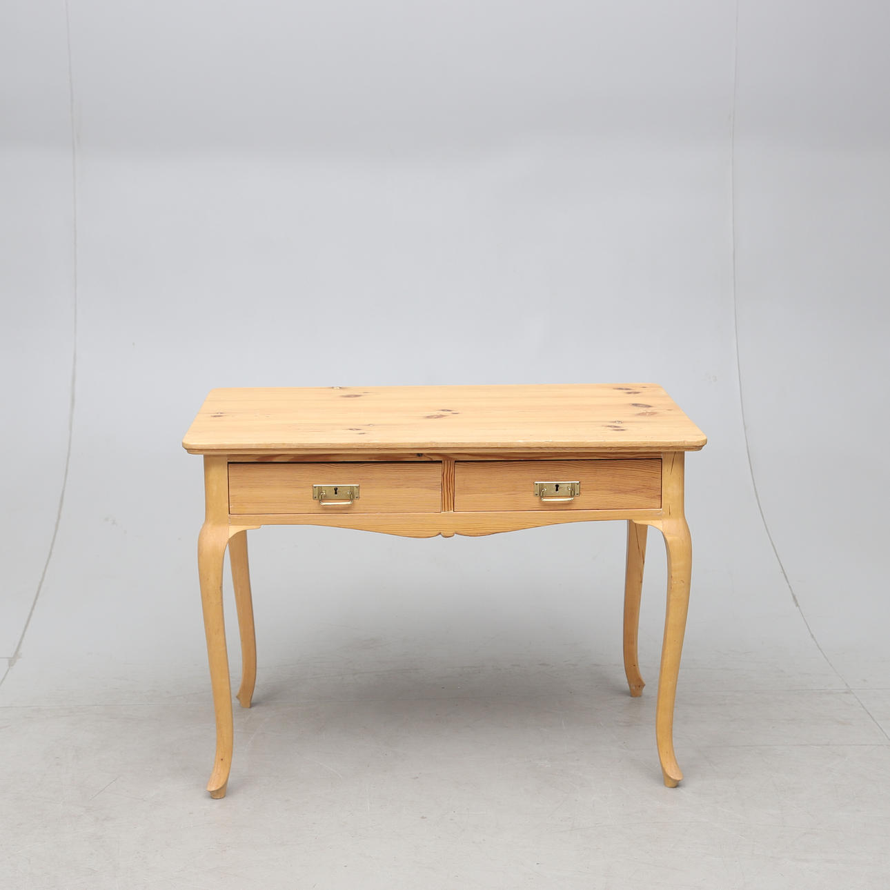 A rococo style desk, circa 1900.