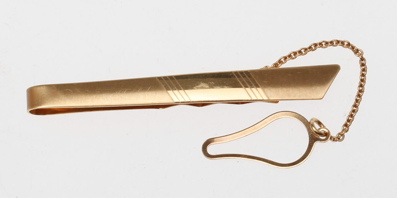 SLIPSNÅL, 18k guld, vikt ca 4 gr.