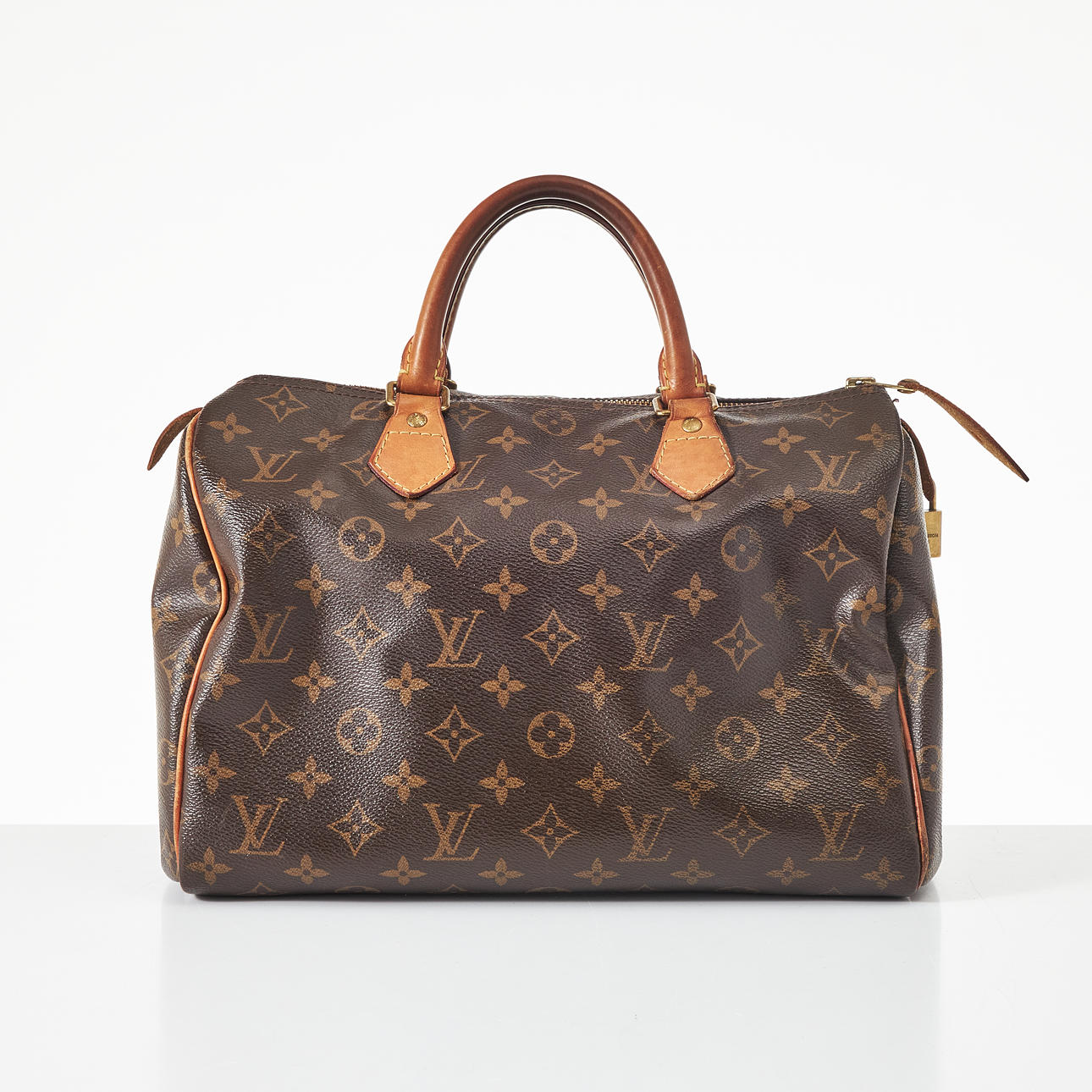 LOUIS VUITTON, a “Speedy 30" handbag.