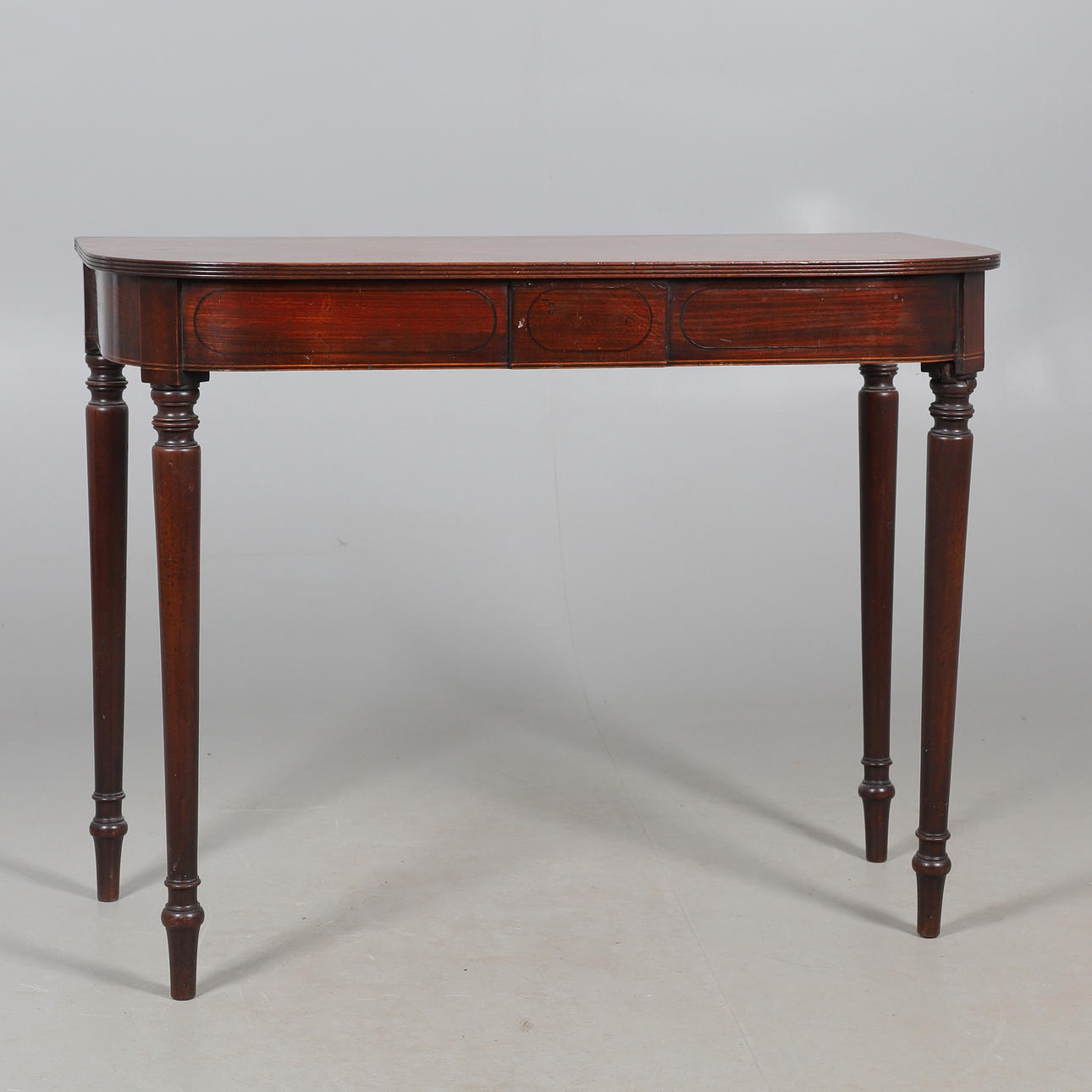 A GEORGE III D SHAPED MAHOGANY SIDE TABLE.