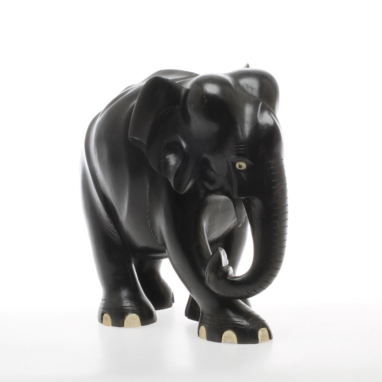 ELEFANT mörkt träslag.