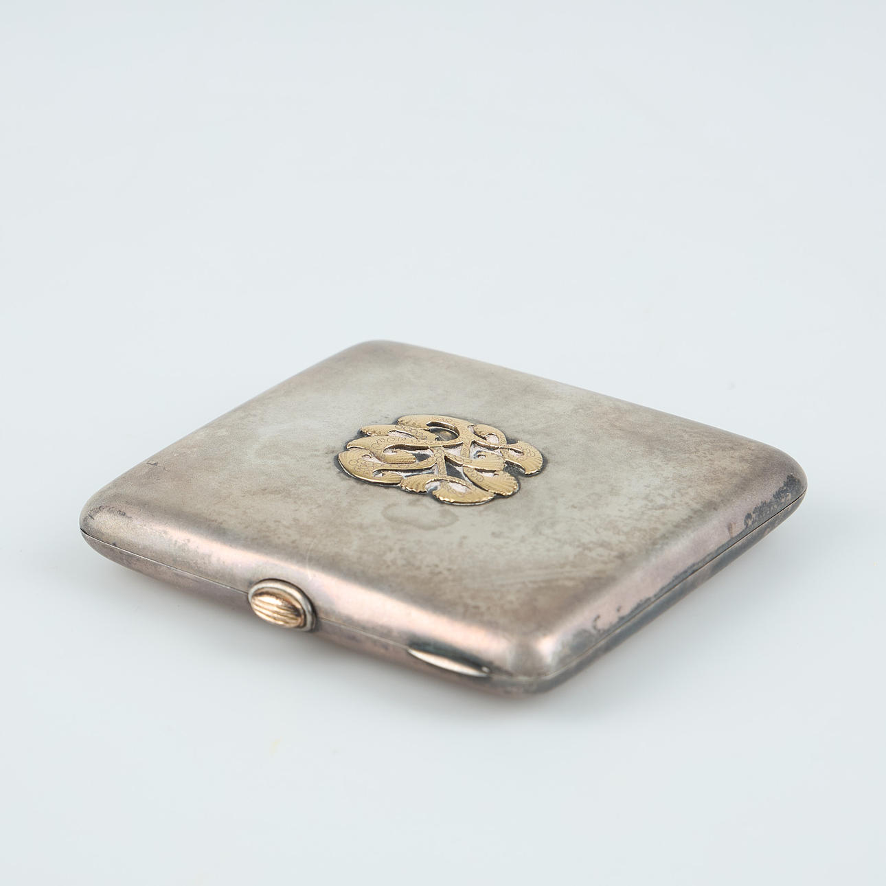 CASE, silver, monogram in gold, Auran Kultaseppää, Turku.