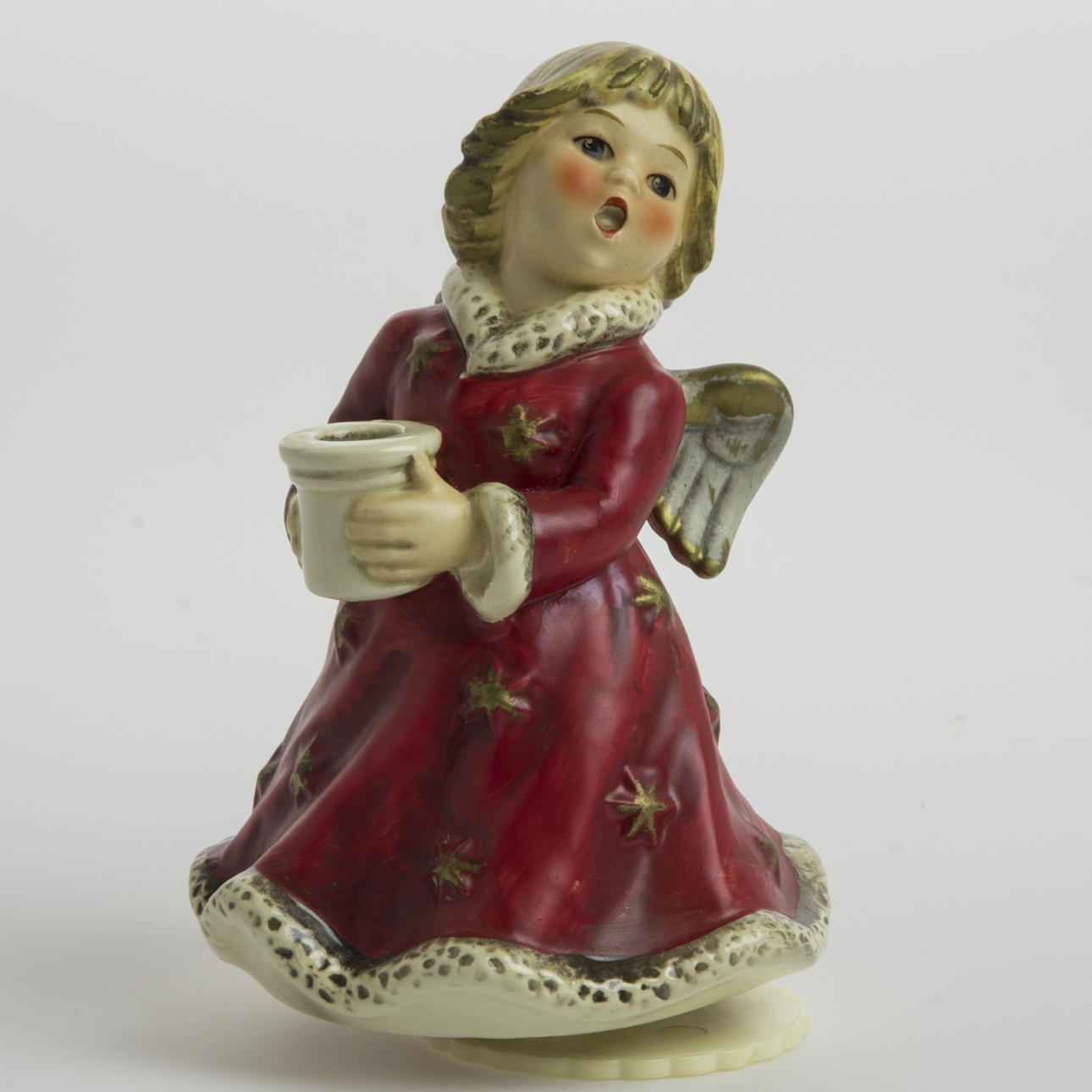 FIGURIN, ängel i form av ljusstake med speldosa, Goebel.