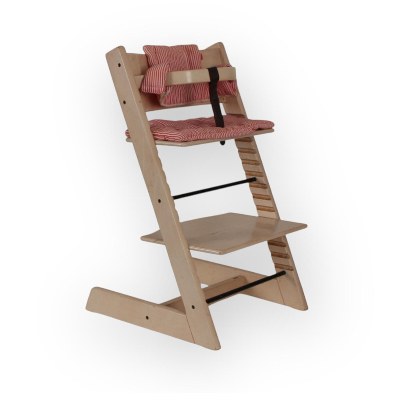 Ein „Tripp Trapp“ -Hochstuhl, Buch, Stokke.