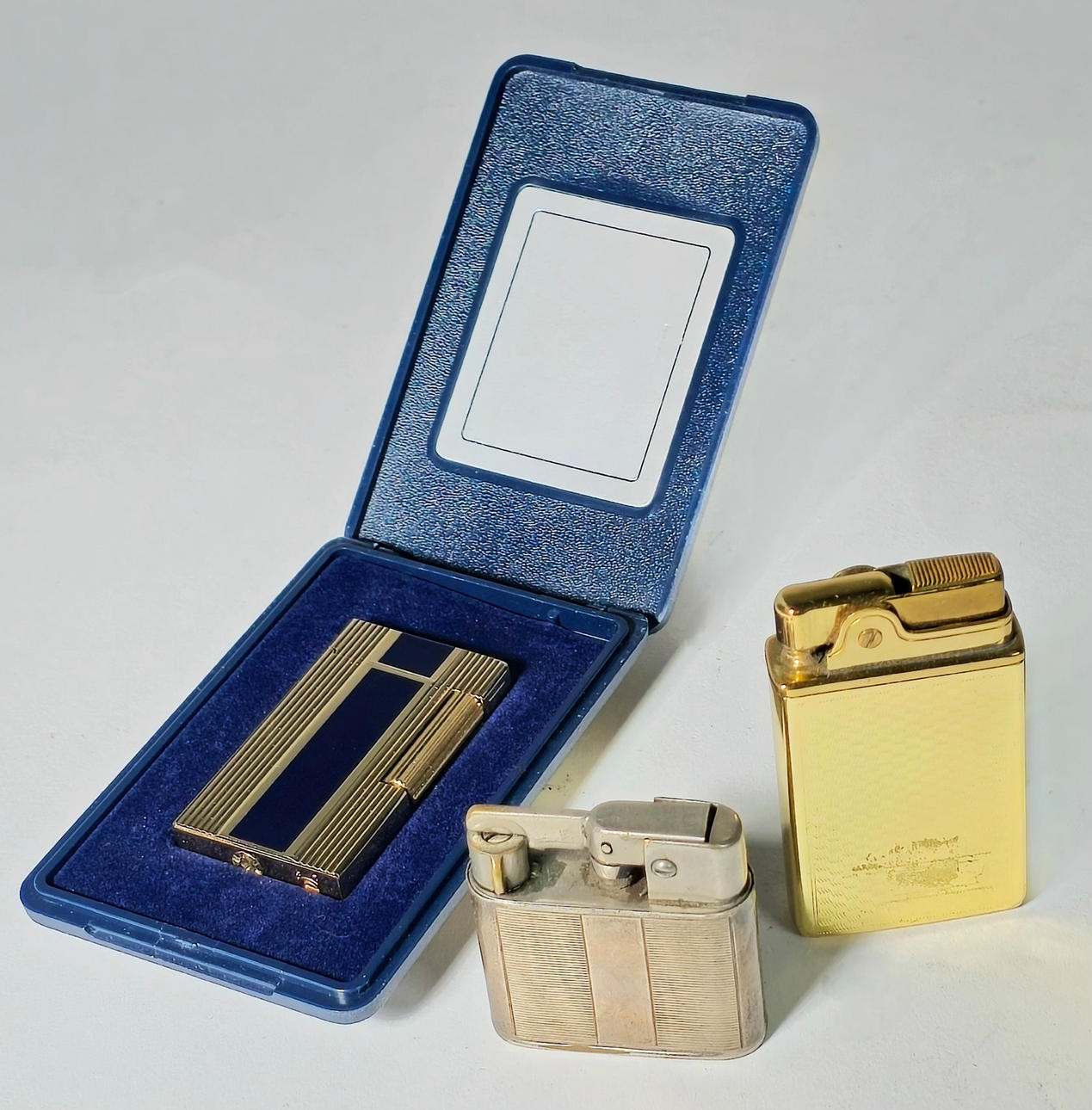 THREE LIGHTERS: 1 MUSICAL CROWN, WITH BLACK LACQUER, LIGHTER WITH