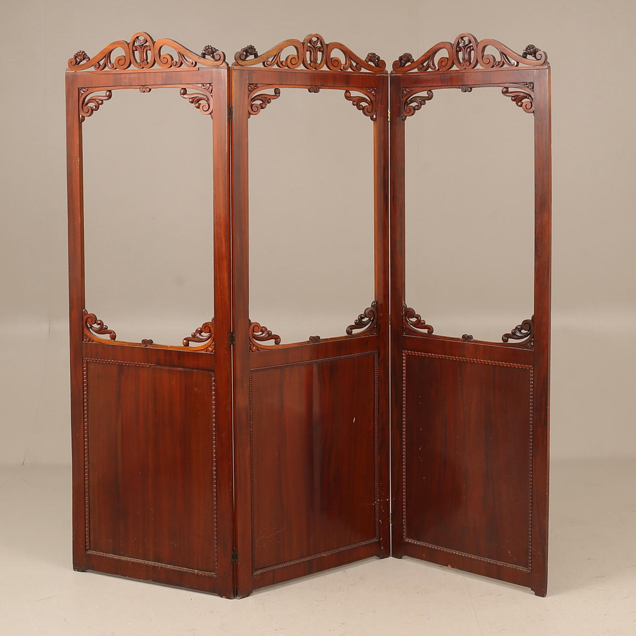 A wooden folding screen, 19th century.