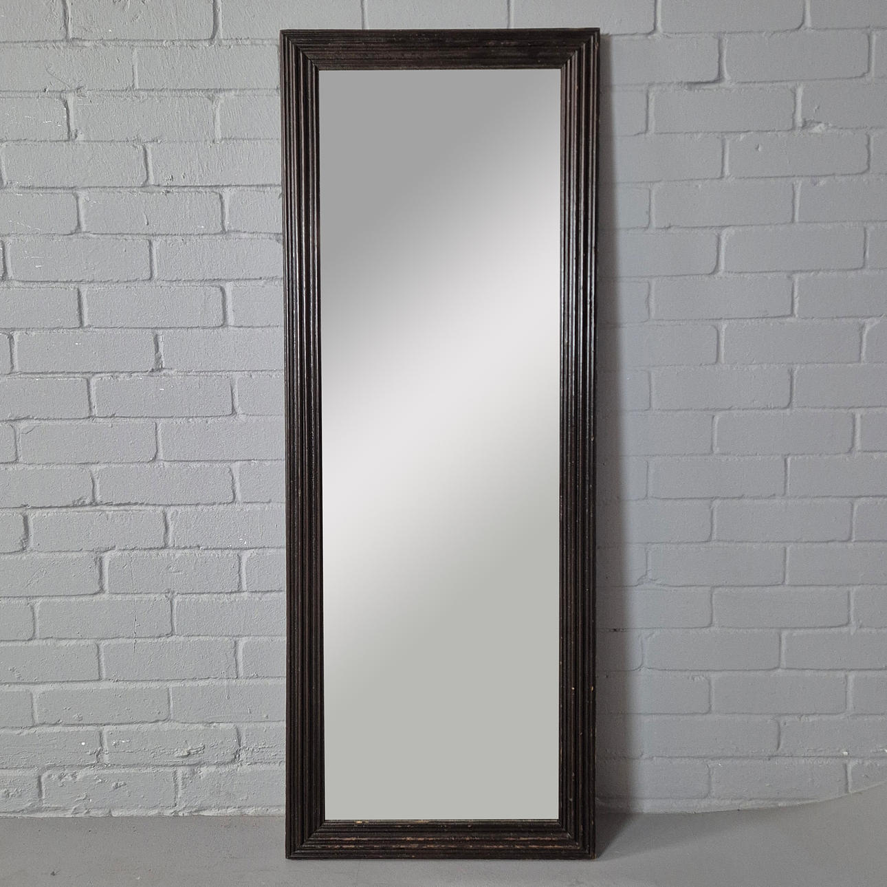 WOODEN FRAMED WALL MIRROR.