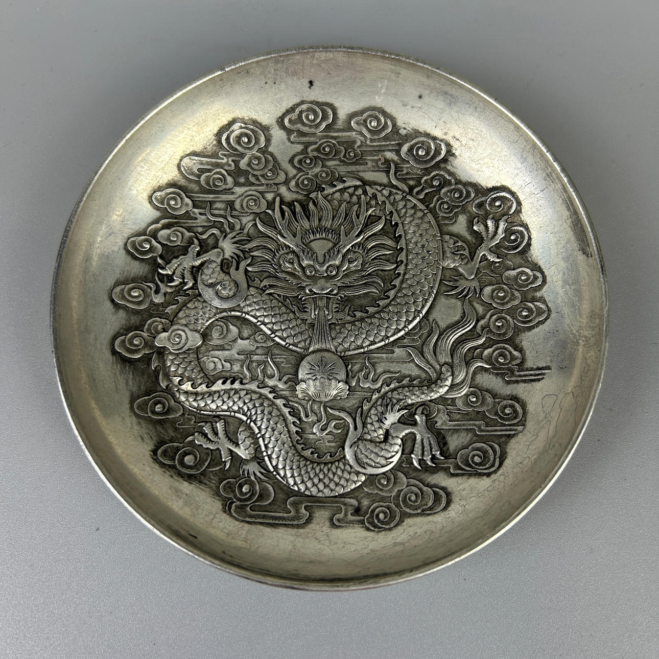 CHINESE WHITE METAL DISH.