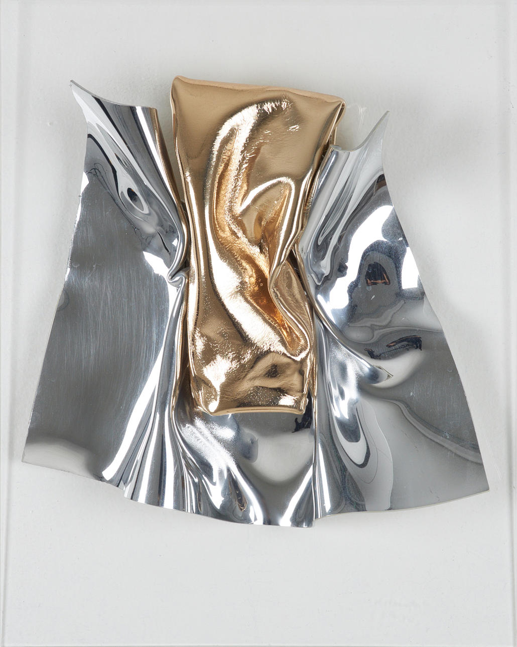 JAN NALIWAJKO. Sculpture/wall relief, gold-foiled plexiglass, signed and dated Jan Naliwajko 1998.