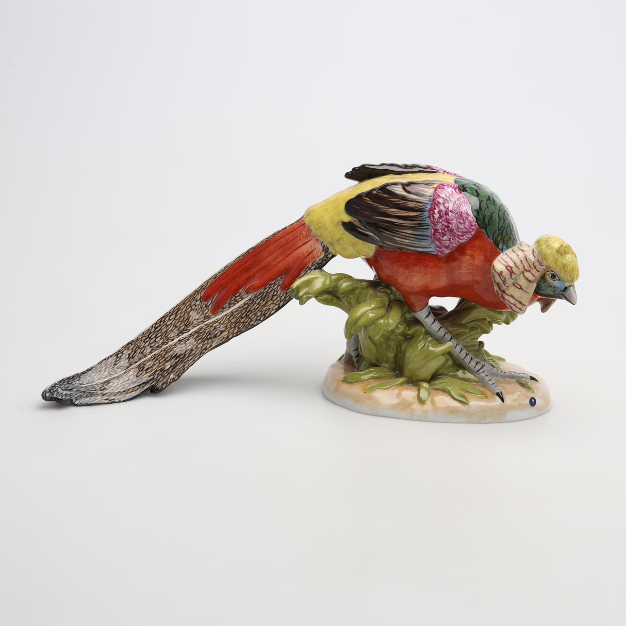 A porcelain peacock figurine from Dresden, Germany.