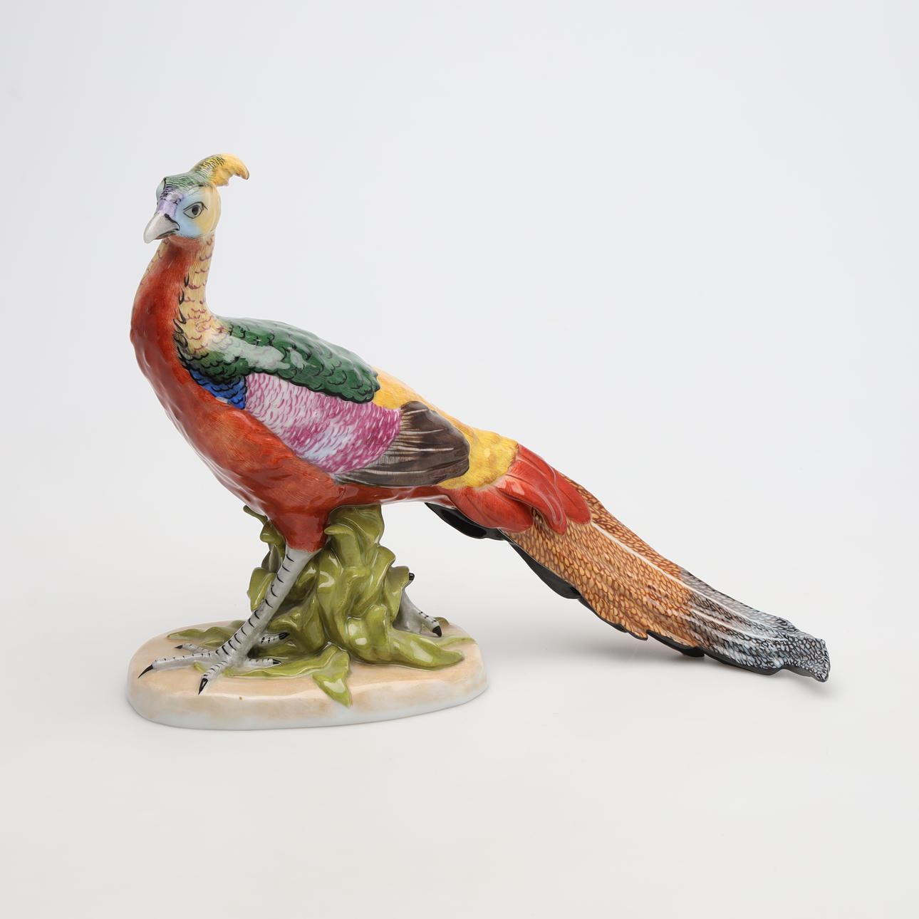 A porcelain peacock figurine from Dresden, Germany.