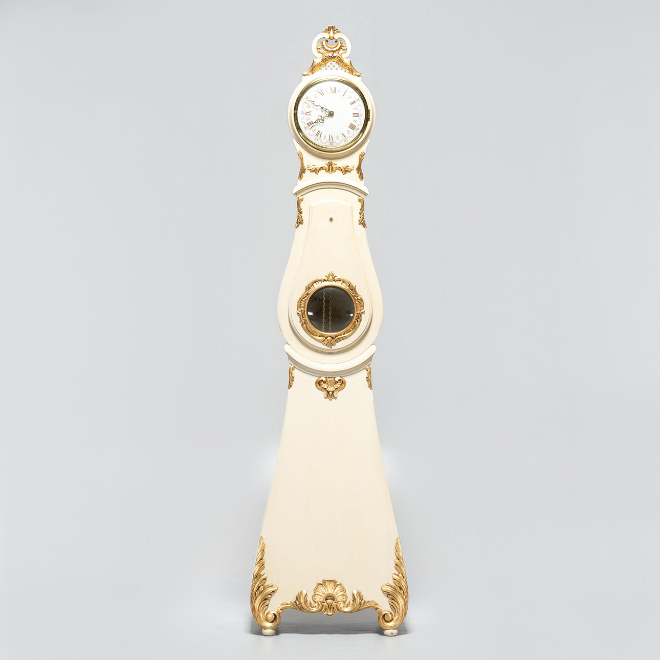 A MORA floor clock, Exacta Sweden, 20th century.