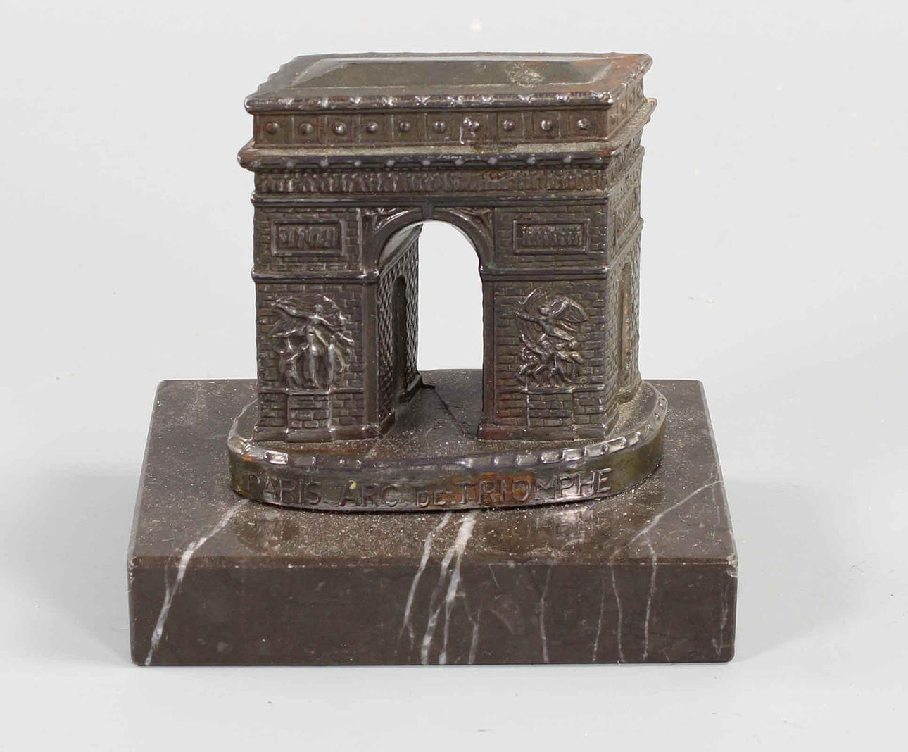 Paris Arc de Triomphe on pedestal.