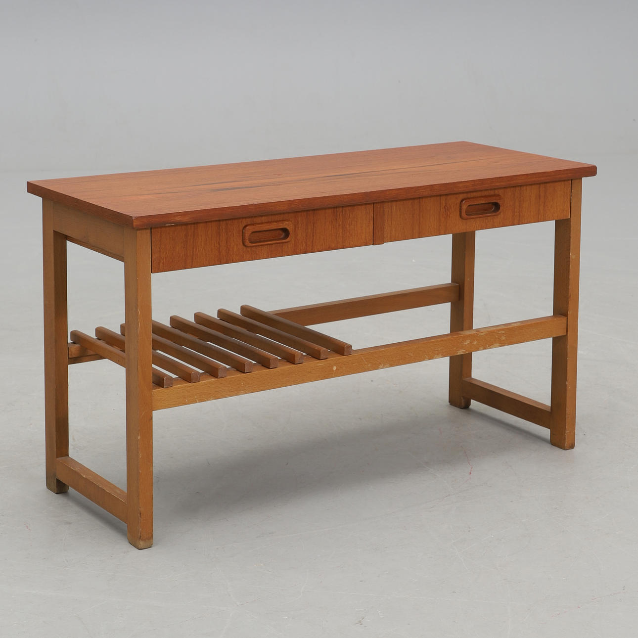 A mid 20th century hall table with two drawers.