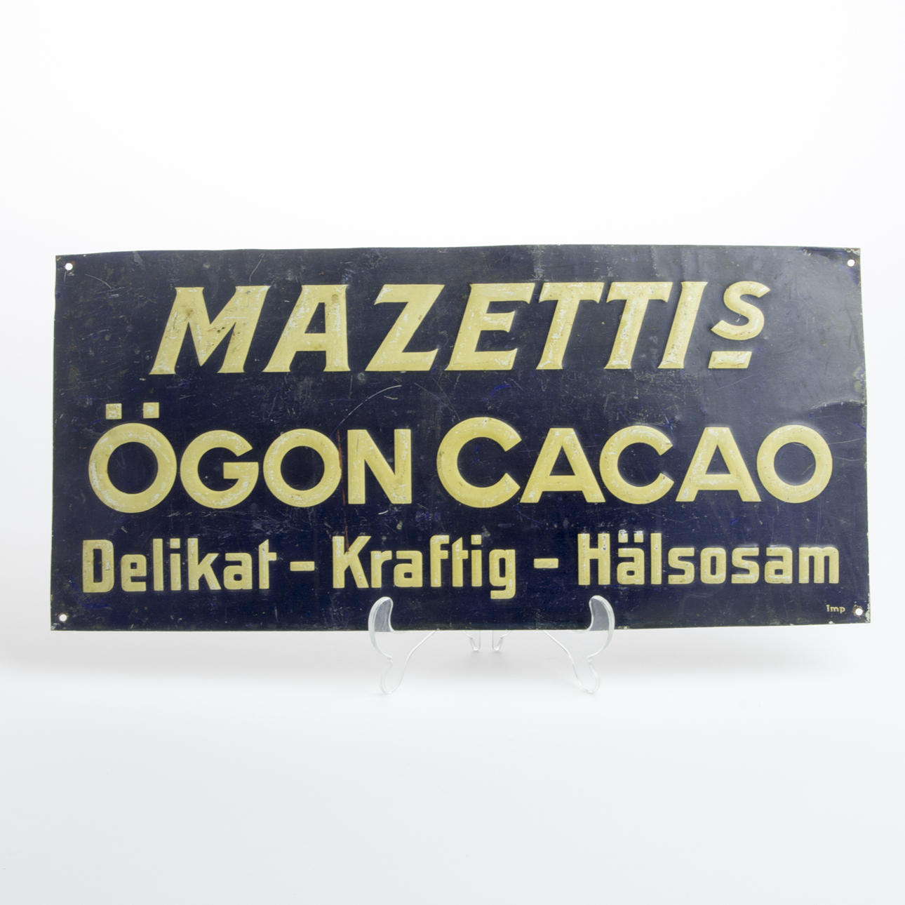 REKLAMSKYLT, Mazettis Ögon Cacao, målad plåt.