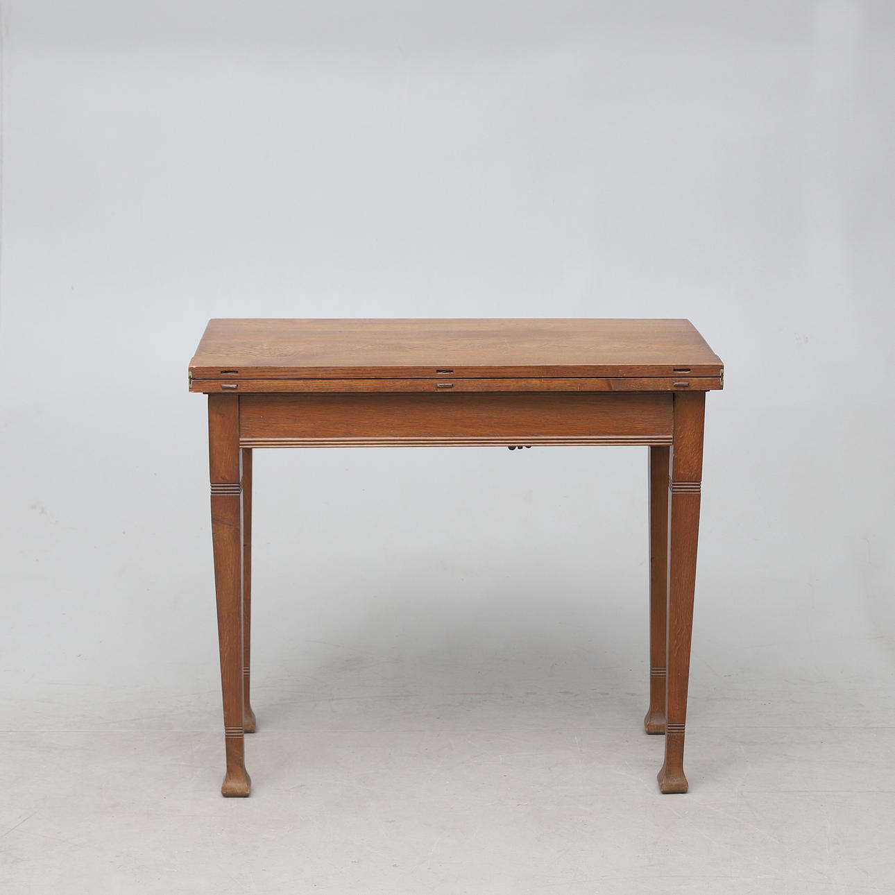 A gaming table, oak, Art Nouveau, circa 1900.