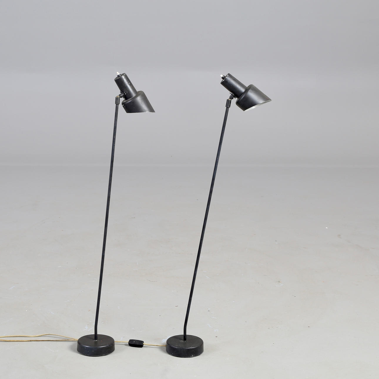 SKANDINAVISK DESIGN. A pair of black painted metal floor lamps, 1960s ...