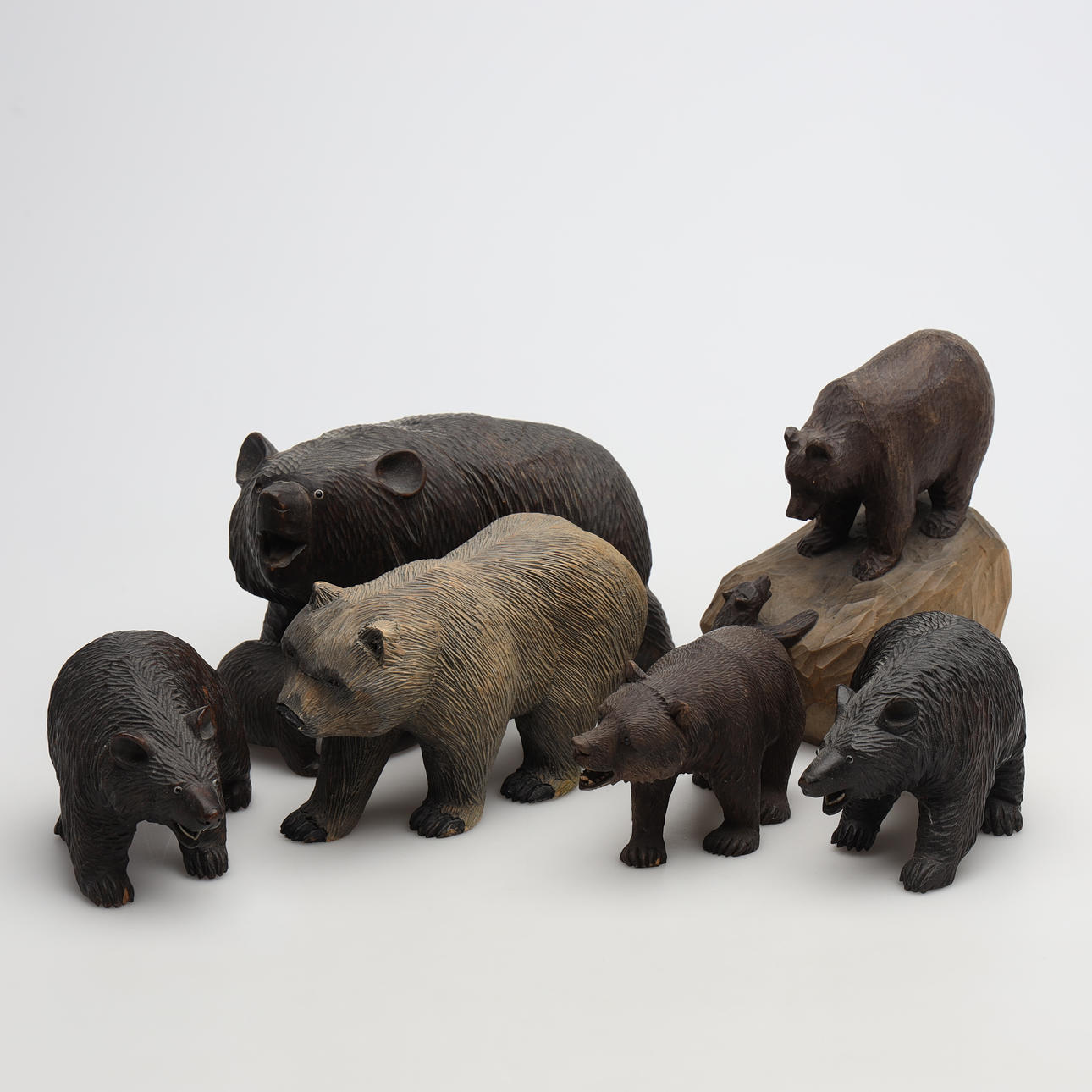 SCULPTURES, 6 pieces, bears, wood, partially signed.