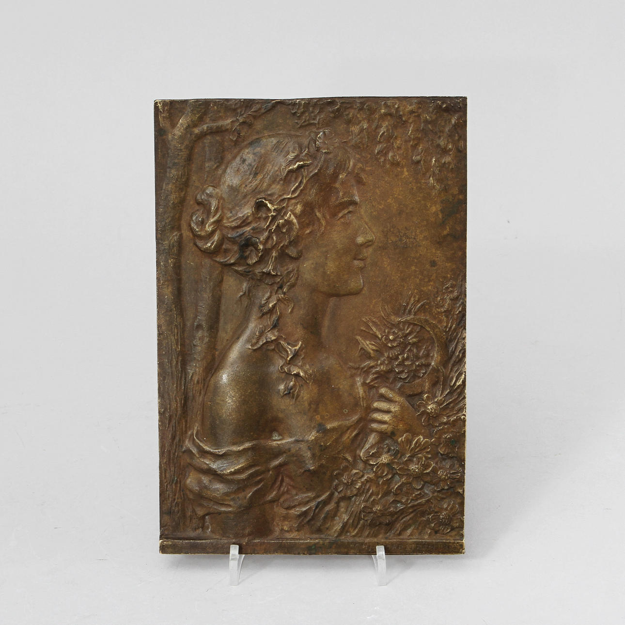 HJALMAR NORRSTRÖM. kvinnoprofil, bronsplakett, sign och daterad 1903.