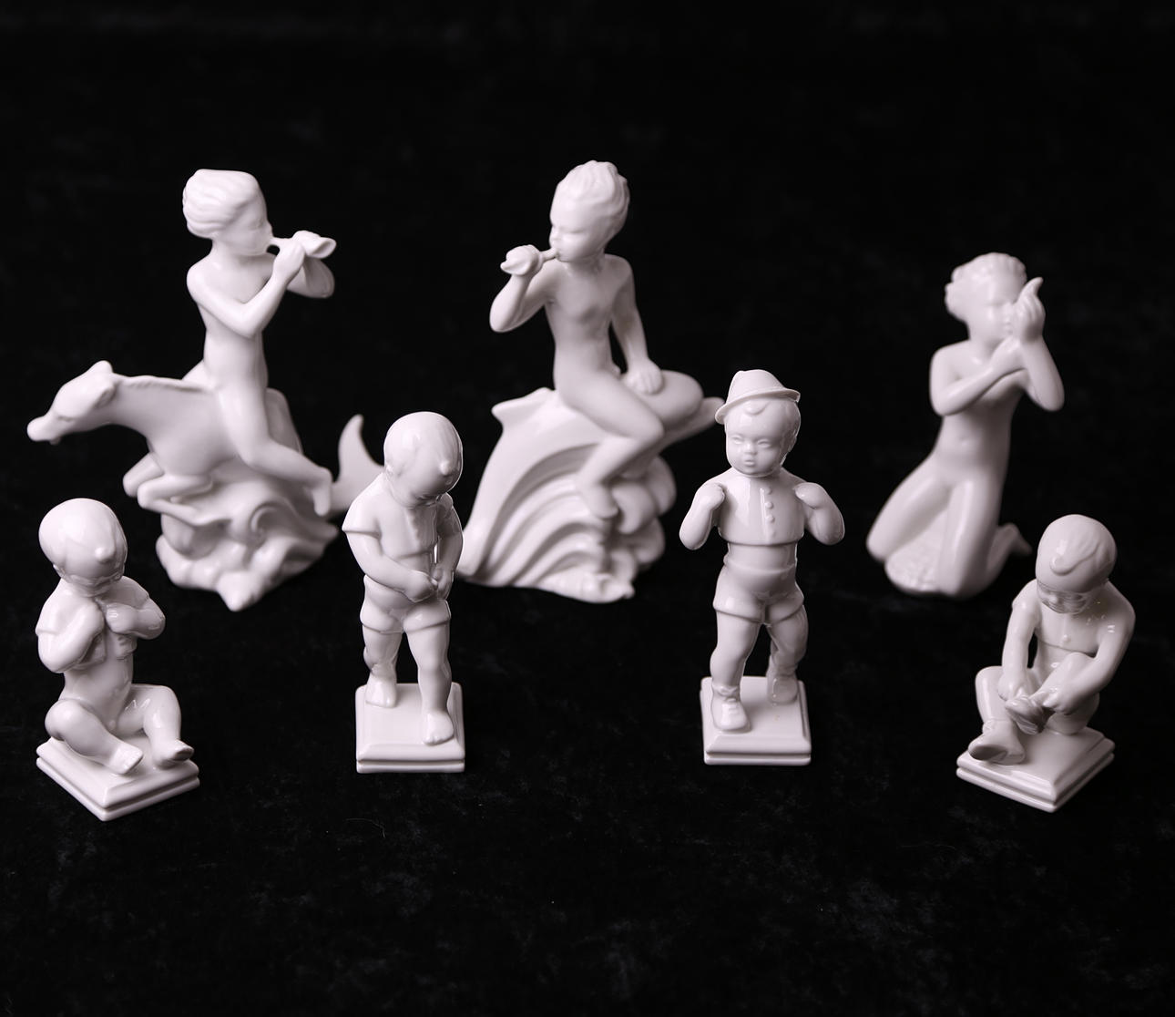 FIGURINER, 7 st, porslin, vita glaserade, Rörstrand, sent 1900-tal.