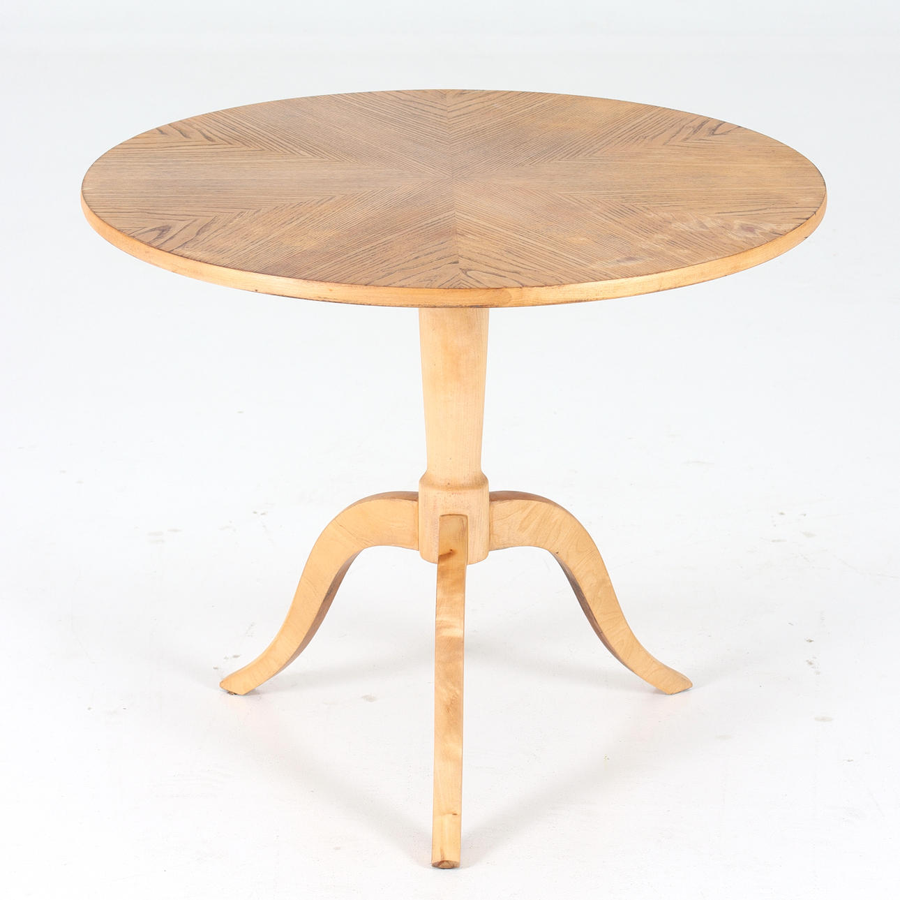 A 20th century hardwood pillar table.