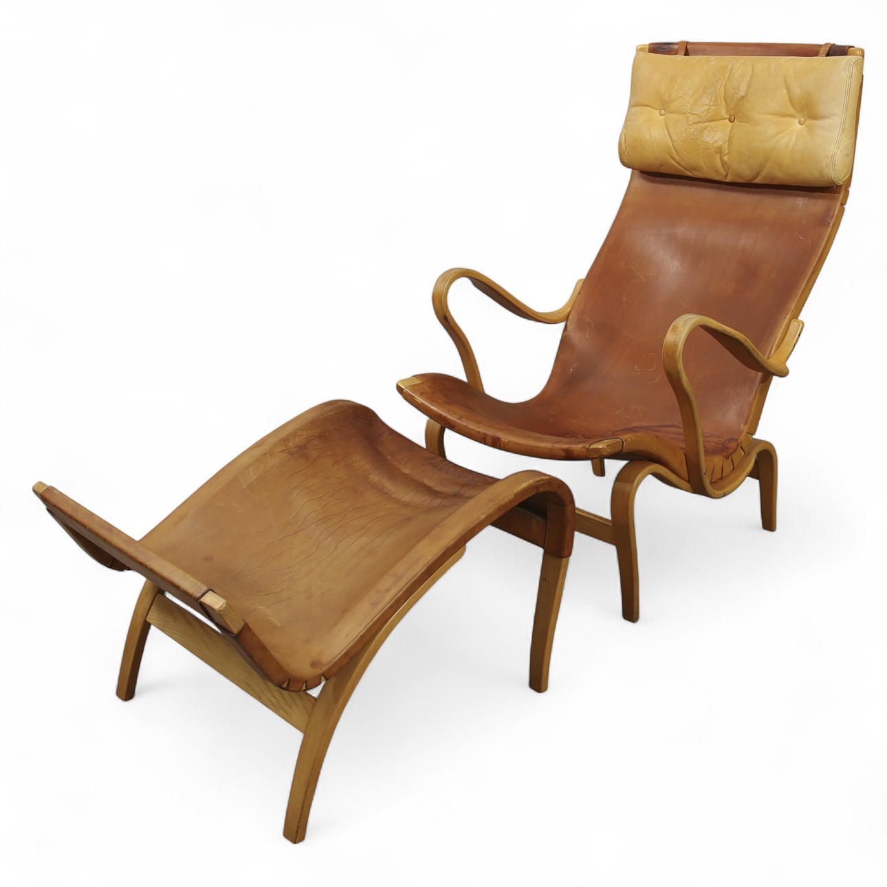 BRUNO MATHSSON. Armchair “Pernilla” with footstool, frame in beech wood ...