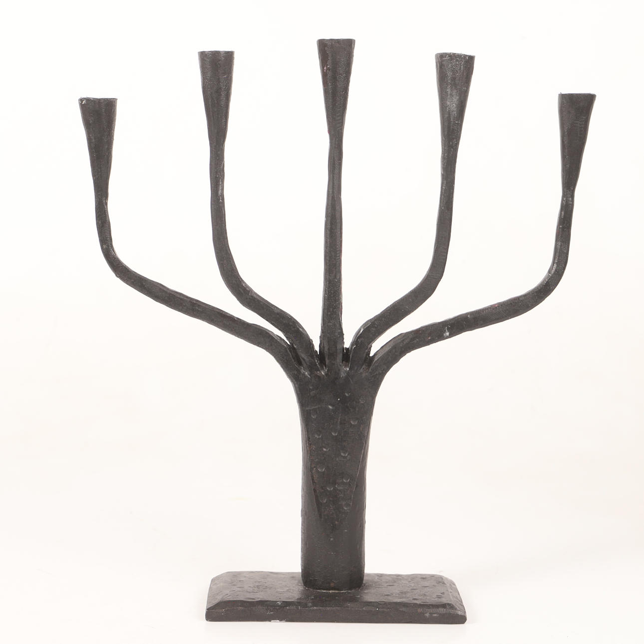 A wrought candlestick, 20th century.