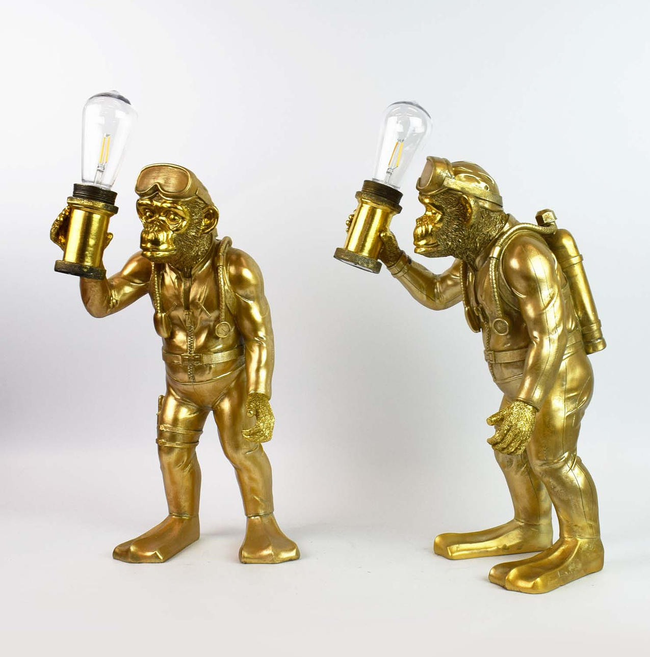 MONKEY DIVER TABLE LAMPS, A PAIR.
