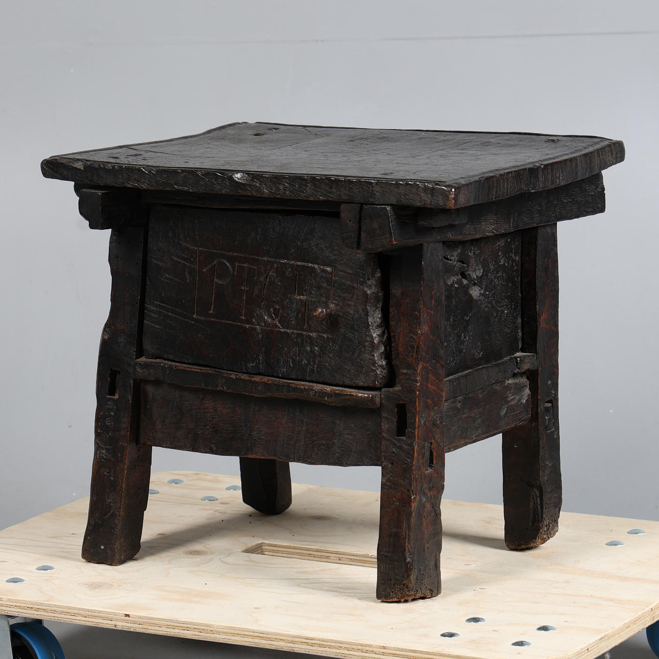 A 17TH CENTURY STYLE OAK DATED STOOL. Furniture - Other - Auctionet
