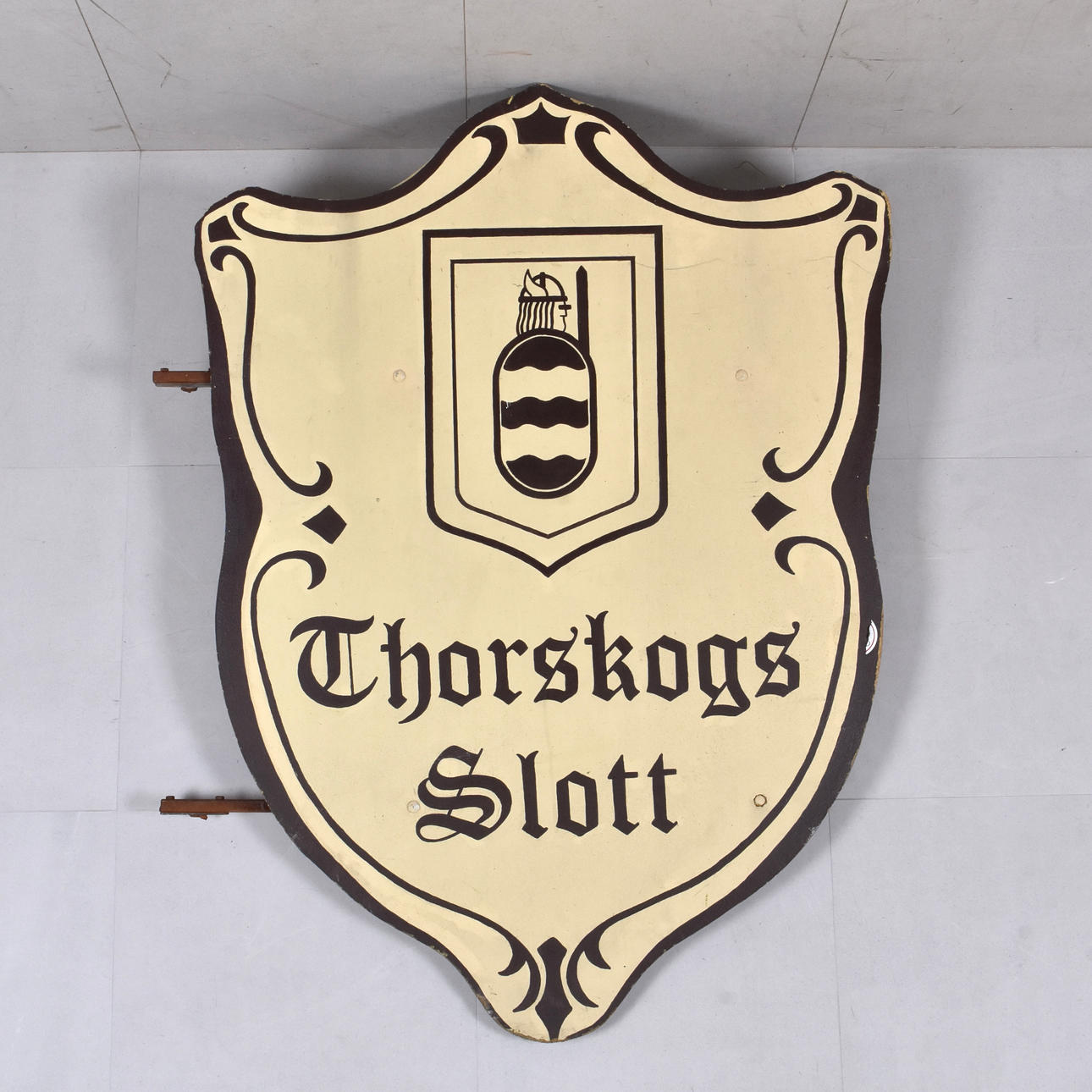 SIGN, PAINTED CHIPBOARD AND FORGING, “THORSKOG'S CASTLE”.