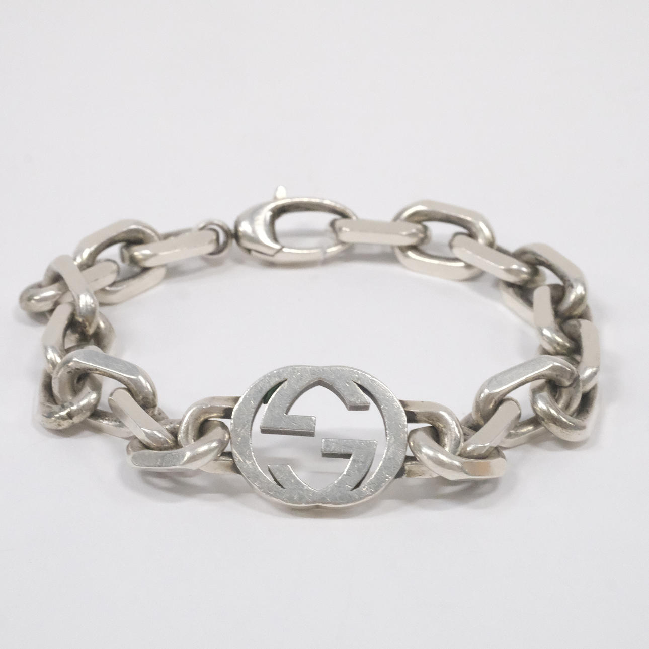 PULSERA, GUCCI, «PULSERA ENTRELAZADA», PLATA.