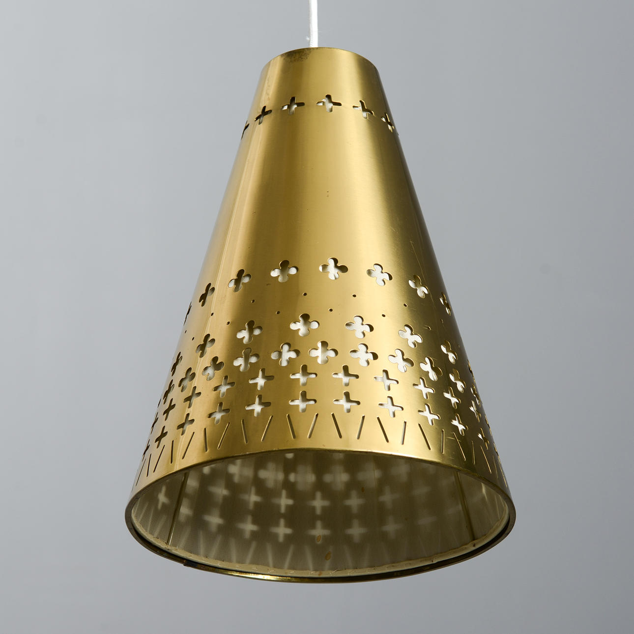 EINAR BÄCKSTRÖM. A brass ceiling lamp, Einar Bäckströms metalvarufabrik, 1950s.