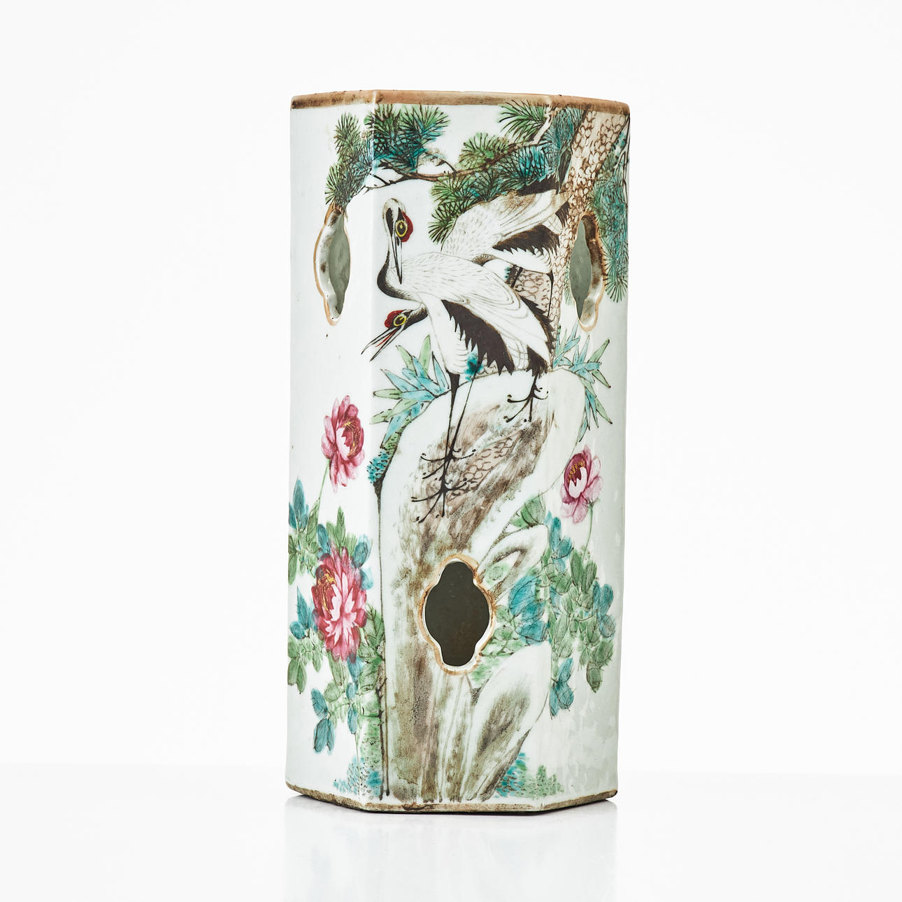 A Chinese porcelain stoneware vase, circa 1900, incised hexagonal shape, decorated with cranes and flowers in family rose and calligraphy.