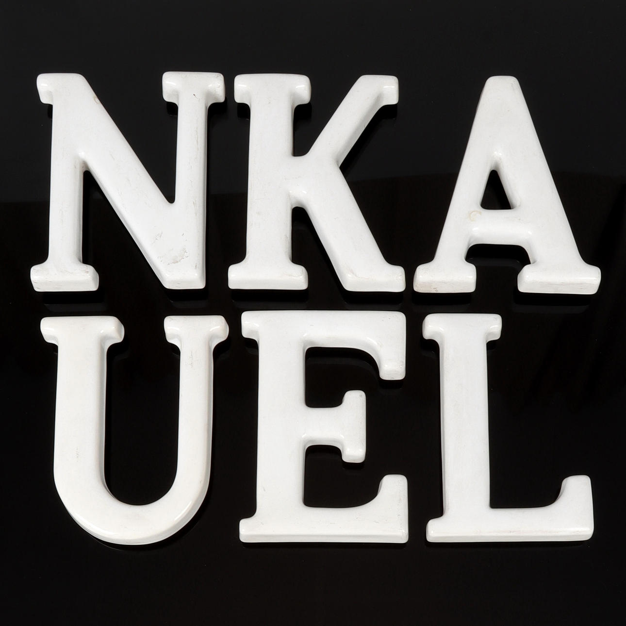 6 porcelain letters. L, K, E, U, N, A. 20th century.