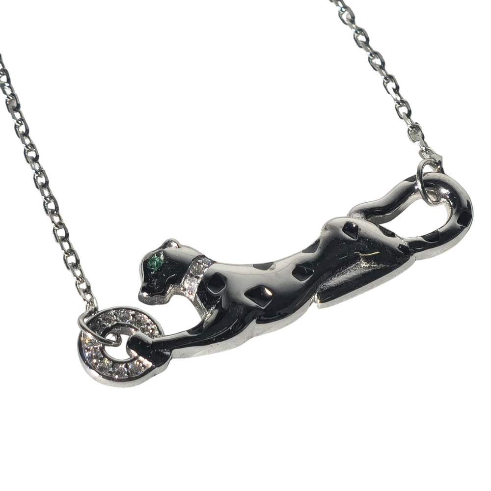 SILVER “PANTHÈRE” NECKLACE AND PENDANT.
