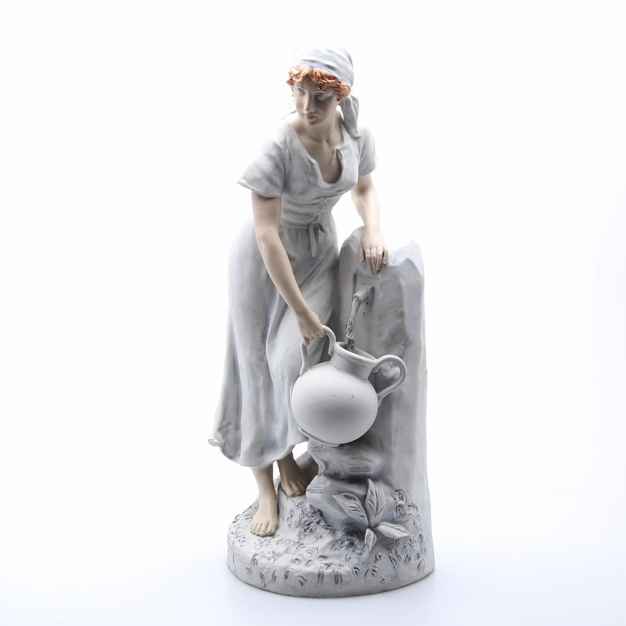 FIGURIN i porslin, Kvinna med kanna vid vattenkran, märkt Royal Dux.