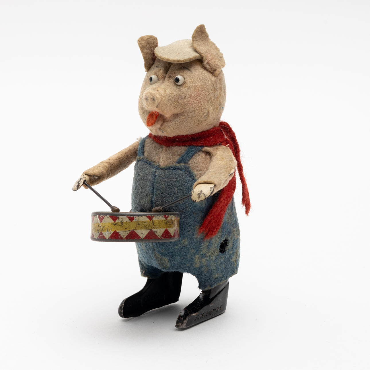 SCHUCO, Pig playing drums, clockwork, felt-covered sheet metal, Germany 1930s.