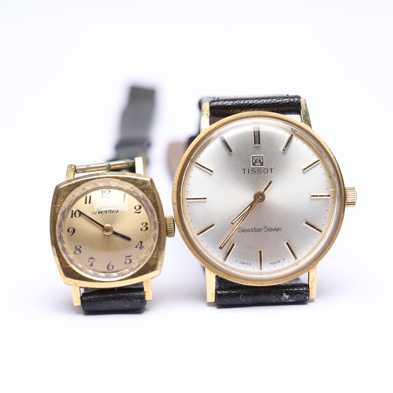 A 2-piece wristwatch, Tissot and Novus, 18k, Gold, with leather ...