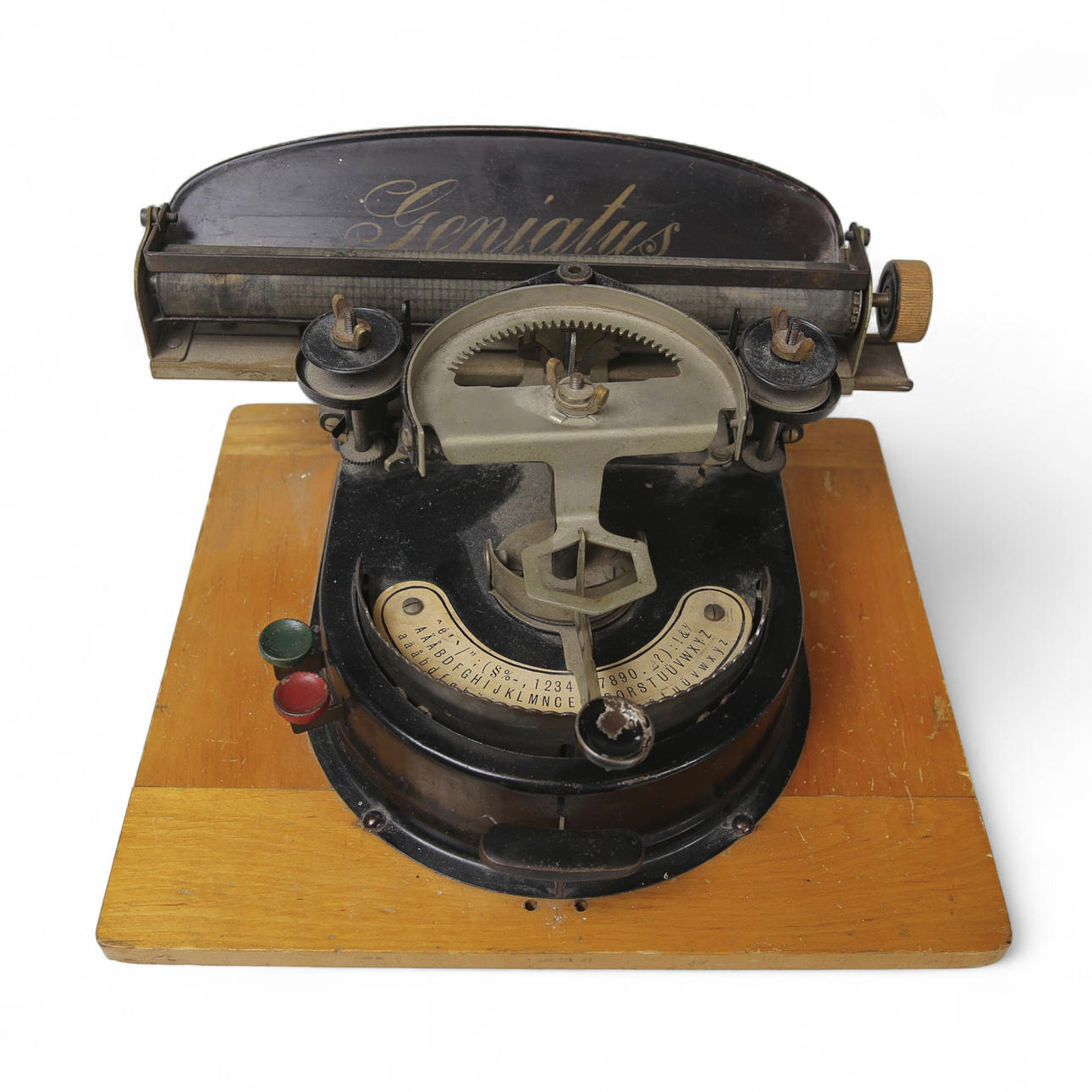 TYPEWRITER Geniatus, metal on wooden stand, 1920s.