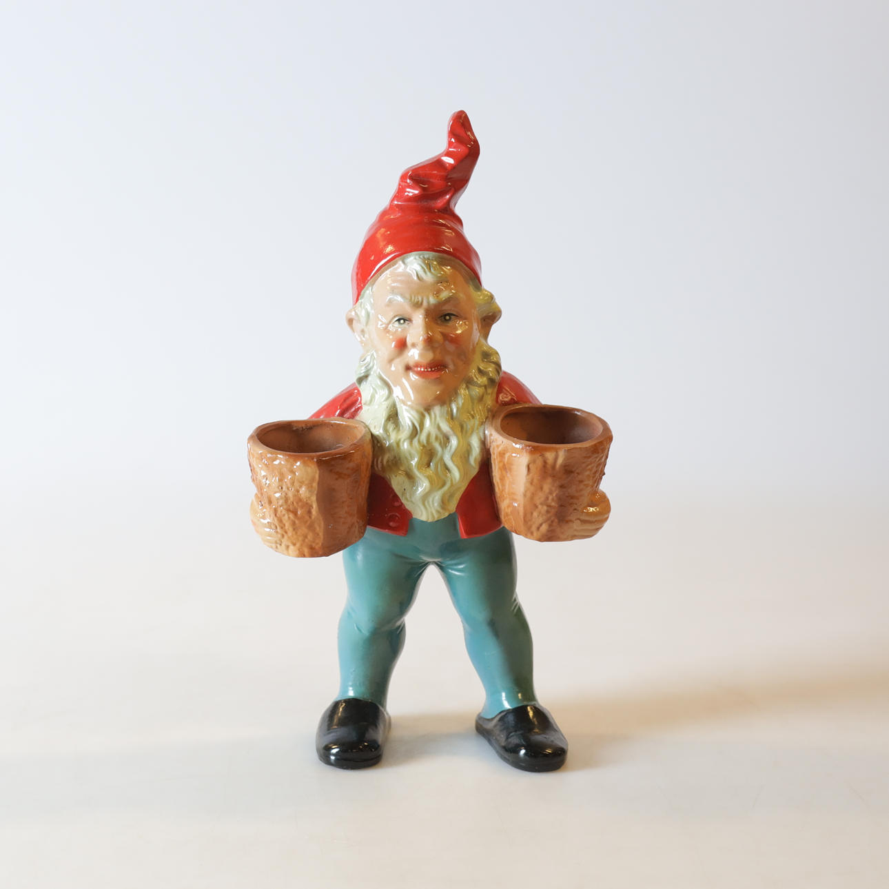 A 20th century ceramic TOMTE with two pots.