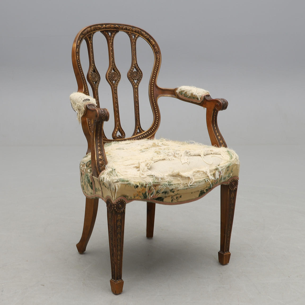 An armchair, circa 1900.