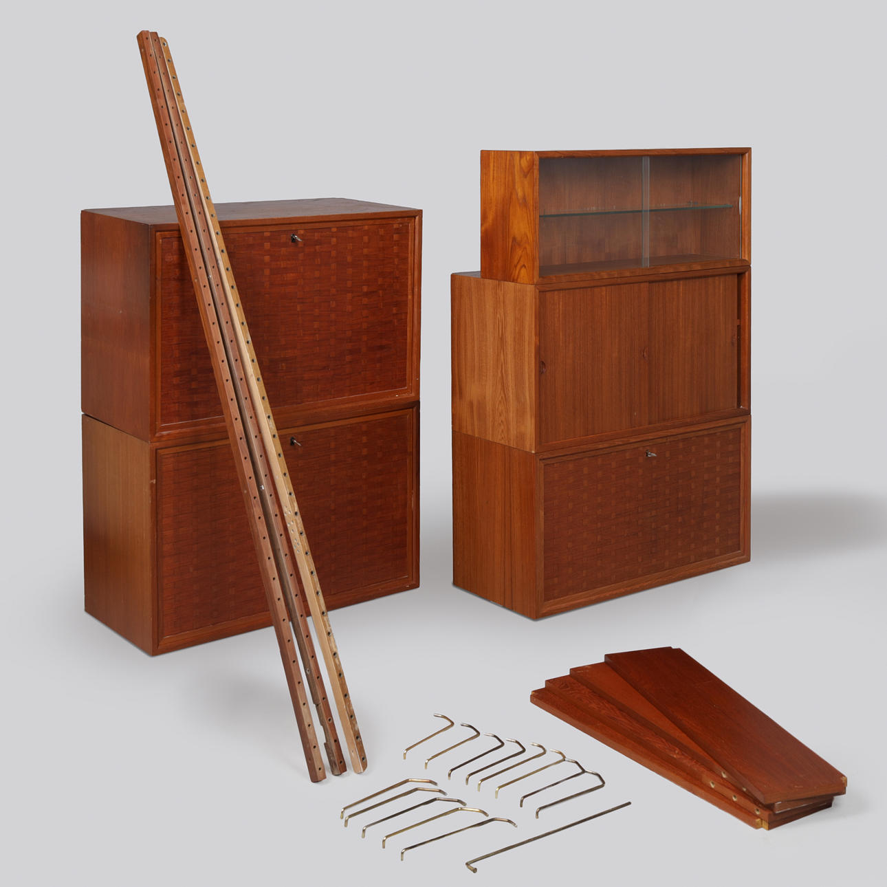 Teak shelving system, “Royal System”, Cado, Denmark, mid 20th century (9+17).