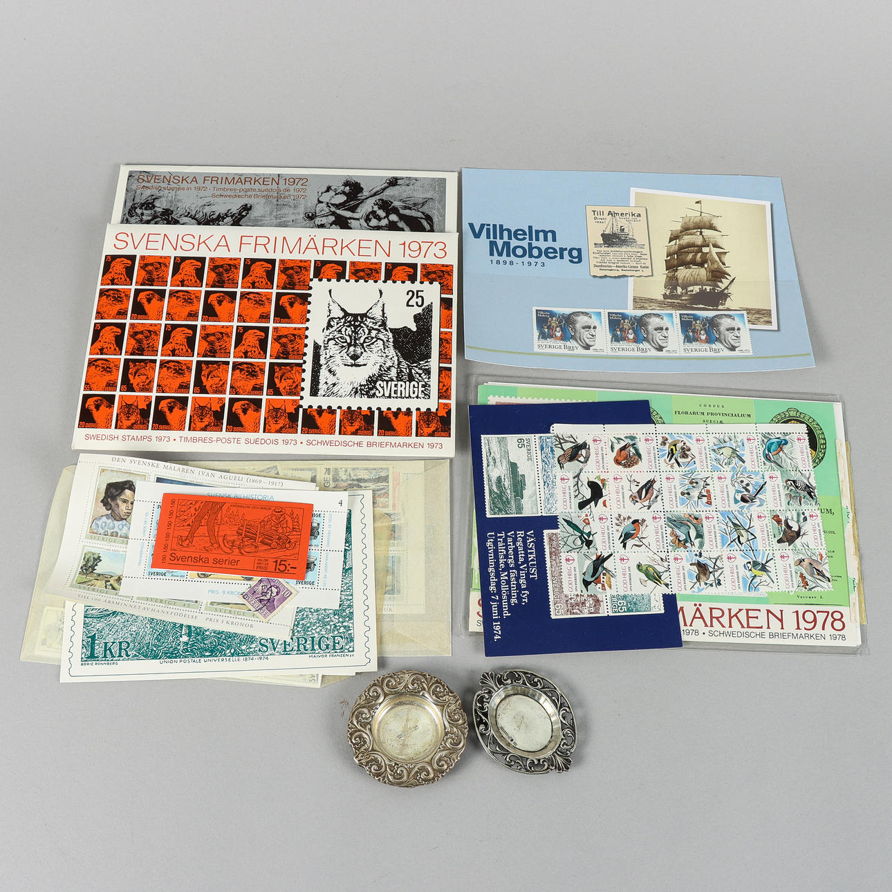 STAMPS and 2 small silver platters.