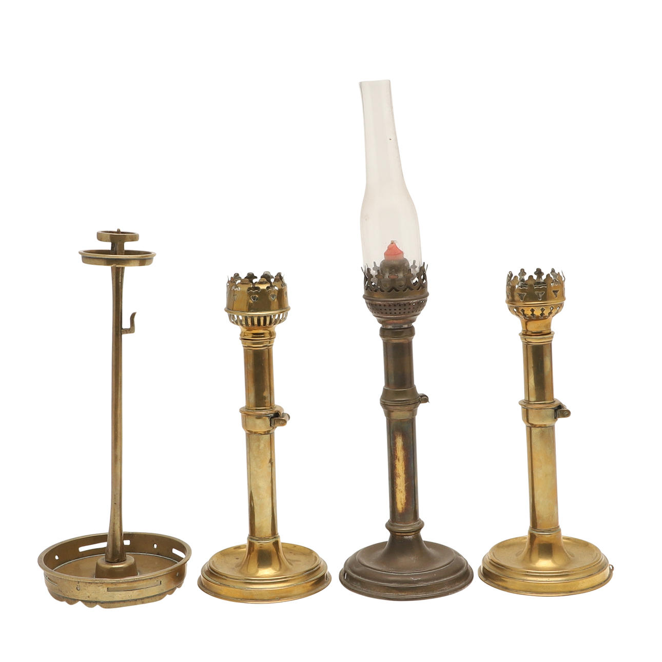 THREE HINGED AND ADJUSTABLE BRASS CANDLE HOLDERS AND A BRASS PRICKET CANDLESTICK.