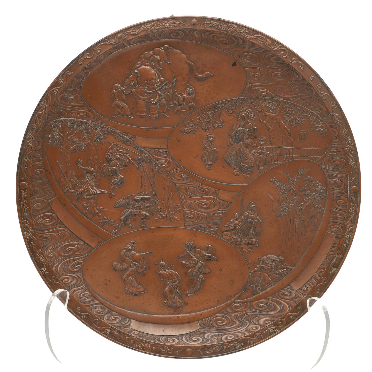 A CIRCULAR JAPANESE BRONZE PLAQUE.