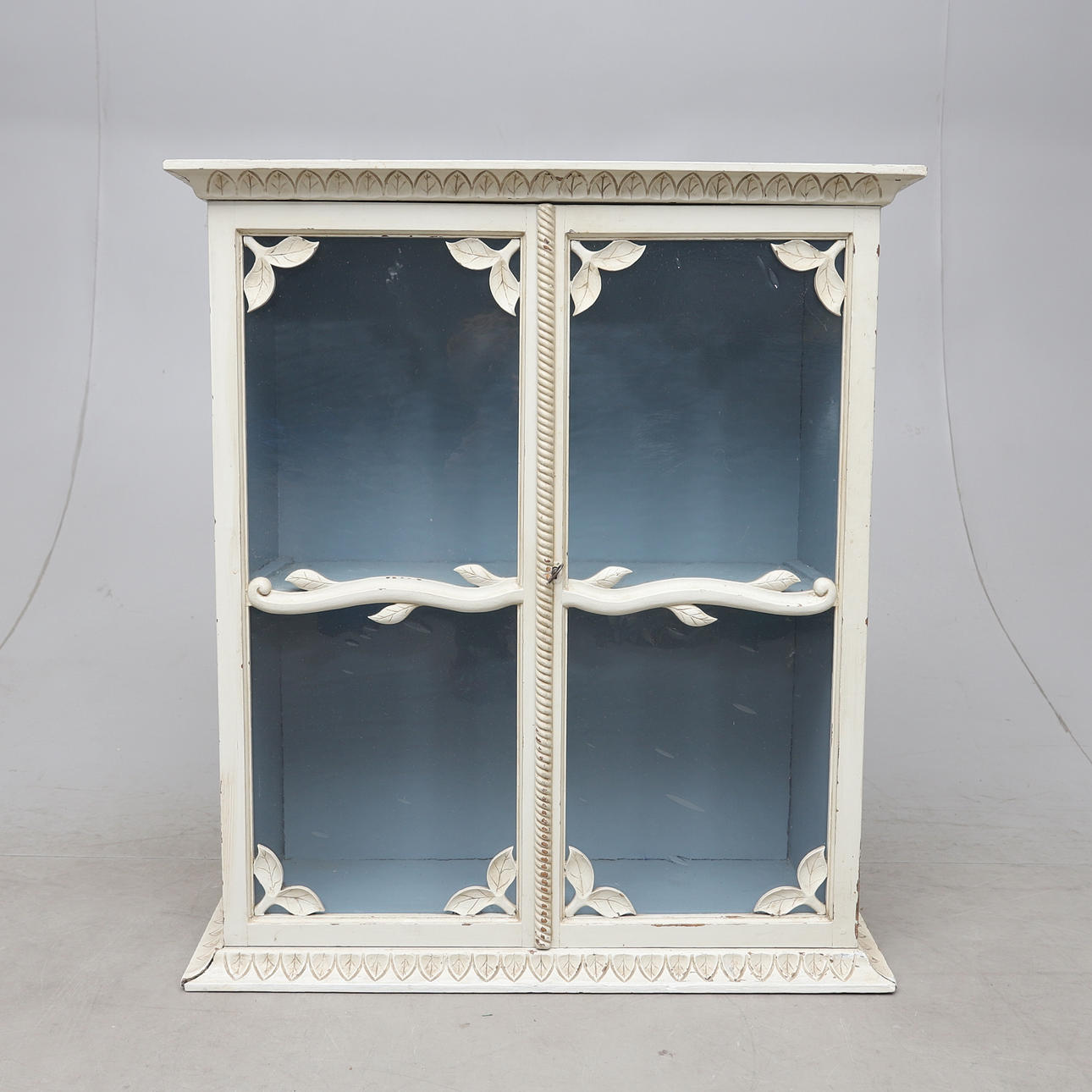 DISPLAY CABINETS. Around 1900.