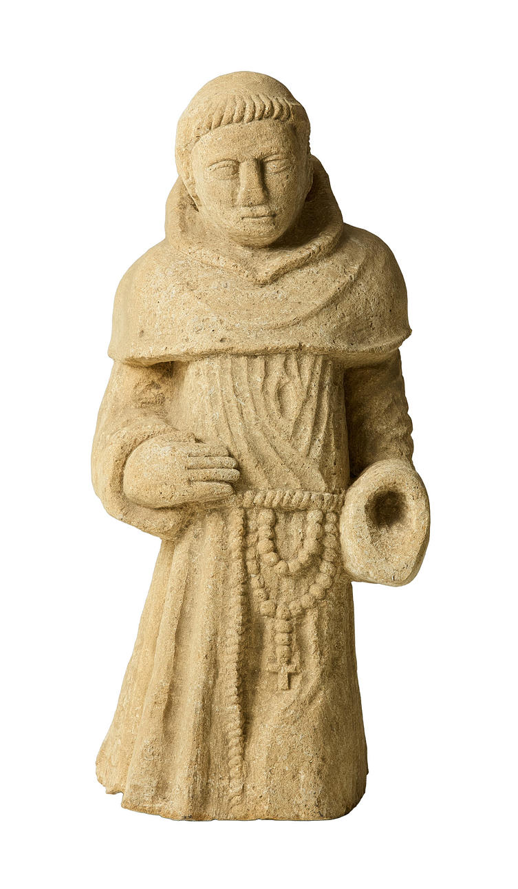 A 15TH CENTURY OOLITIC LIMESTONE FIGURE OF A TONSURED MONK, CIRCA 1450 ...