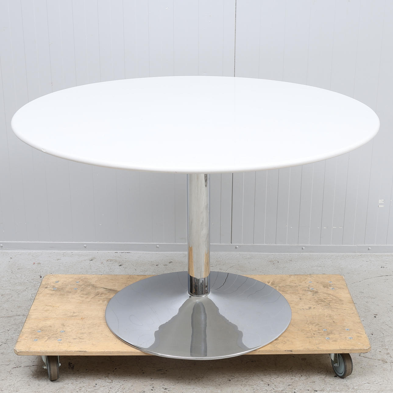 DINING TABLE, white laminate top, central chromed pillar base, 21st century.